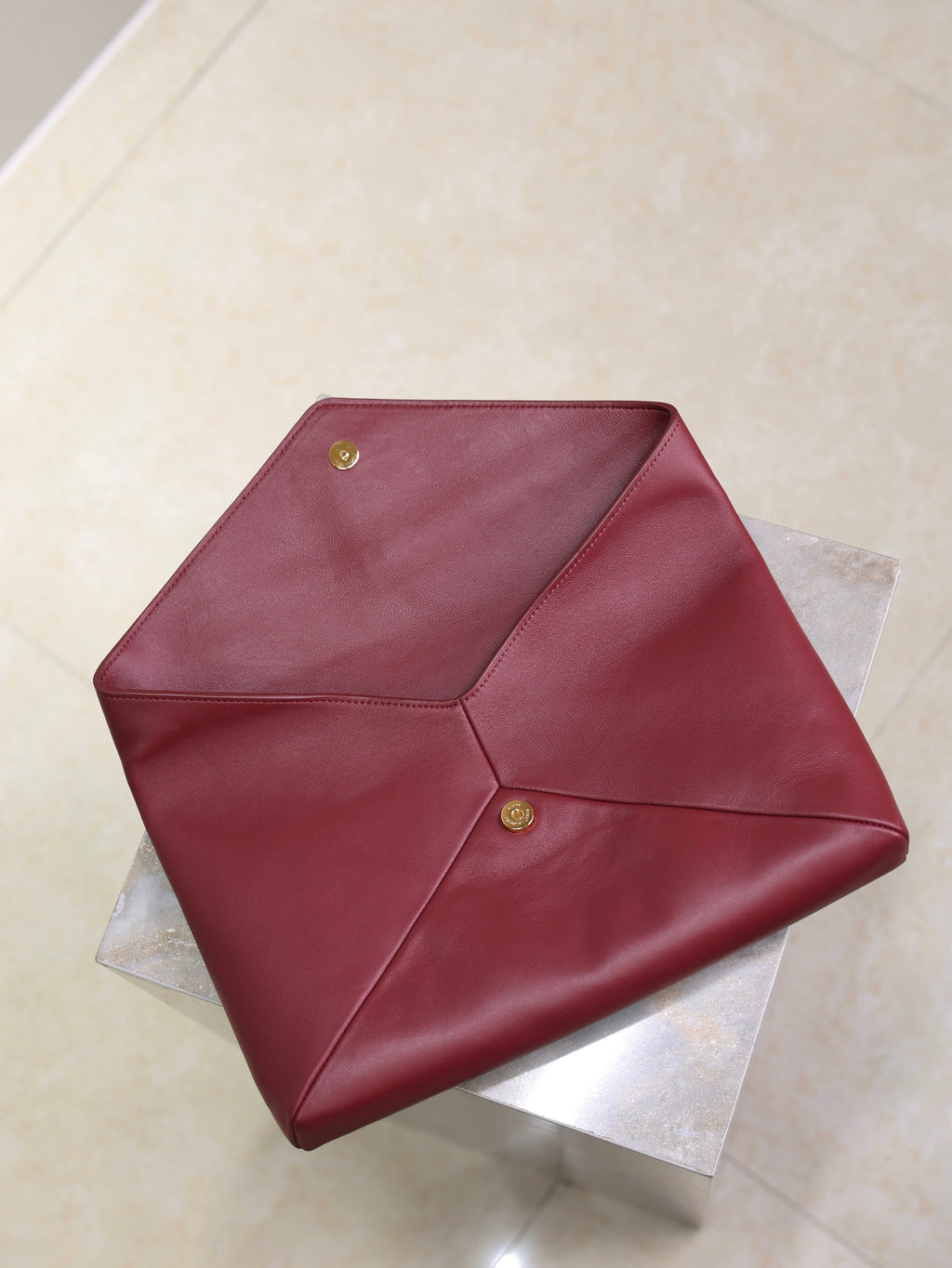 YSL 25S CASSANDRE LARGE ENVELOPE POUCH 29 IN DARK RUBY SHINY CALFSKIN GOLD HARDWARE