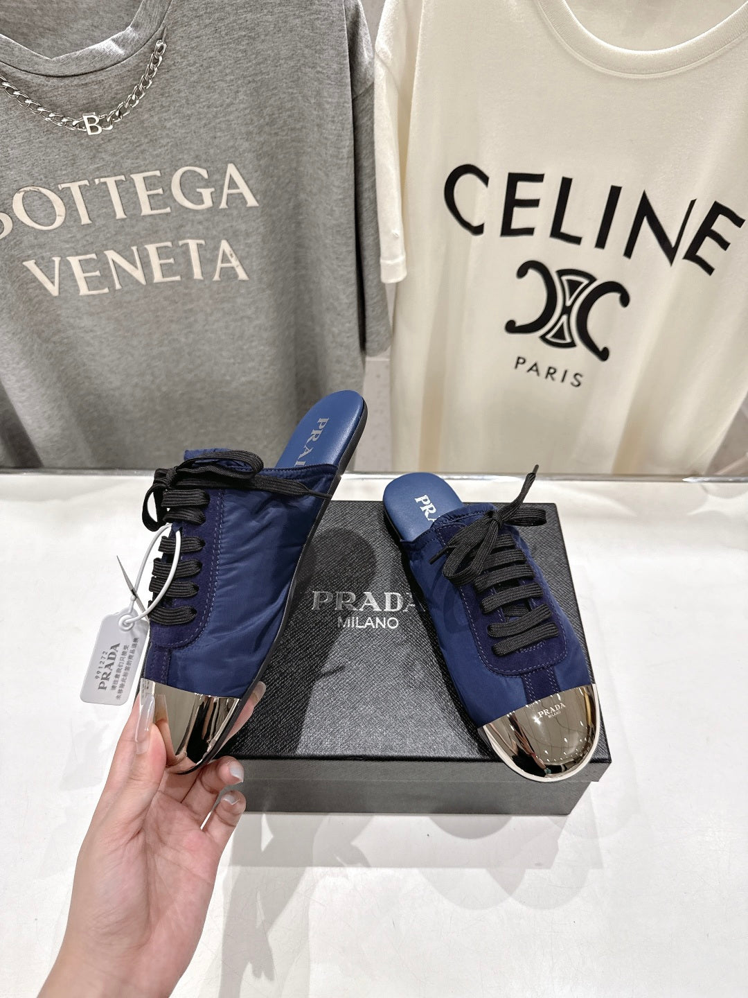 PRADA 25S MULES IN DARK BLUE WITH METAL TOECAP