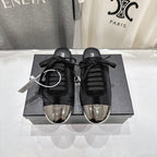 PRADA 25S MULES IN BLACK WITH METAL TOECAP