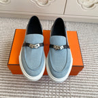 HM 25S SLIP-ON IN SKY BLUE CANVAS AND BLACK LAMBSKIN WITH SILVER HARDWARE