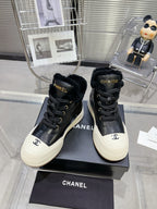 MARTIN BOOTS IN BLACK CALFSKIN AND LAMB FUR LINING