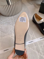 CHANEL 25S TWO TONE LACE UP IN BLACK AND WHITE CALFSKIN
