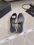CHANEL 25S SLINGBACK IN BLACK AND WHITE CALFSKIN GOLD HARDWARE