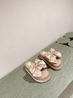 CC SLIPPERS WITH SILK BOW IN BEIGE ALMOND COWHIDE