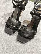 YSL 25S HIGH-HEEL SANDALS 100 MM IN BLACK SATIN WITH YSL LOGO HEEL DESIGN IN GOLD