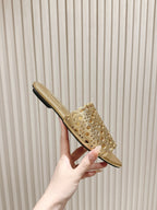 ALAIA PERFORATED SLIDE SANDALS 25S IN LIGHT GOLD LAMBSKIN