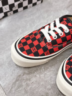 VALENTINO 25S GARAVANI X VANS SNEAKERS IN RED MIX BLACK CANVAS