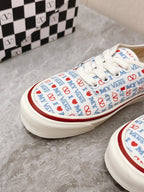 VALENTINO 25S GARAVANI X VANS SNEAKERS IN WHITE MIX BLUE CANVAS