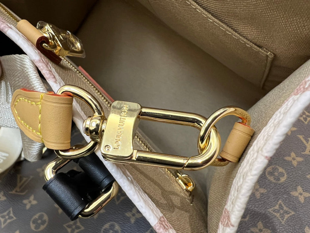 onthego pm 25 cream monogram empreinte embossed calfskin bagcharm