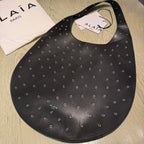 ONE PIECE MEDIUM BAG 39 IN BLACK SHEEPSKIN EYELET DETAILING
