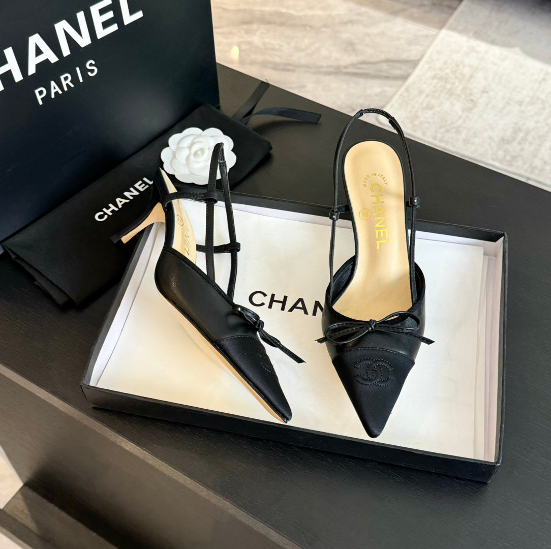 SLINGBACK WITH BOW IN BLACK LAMBSKIN