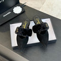 CC MULE IN BLACK SMOOTH FLEECE WITH GOLD HARDWARE