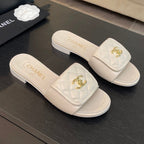 FLAT MULE IN WHITE LAMBSKIN