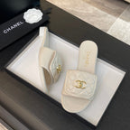 FLAT MULE IN WHITE LAMBSKIN