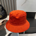 MM BUCKET IN ORANGE VELVET WITH LOGO