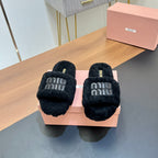 SLIPPERS IN BLACK LAMB WOOL