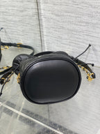 MONTAIGNE MINI 18 BUCKET BAG WITH DRAWSTRING IN BLACK LAMBSKIN