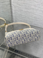 CD Miss Caro 24 blue raffia-effect fabric