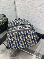 DIOR 25S TRAVEL BACKPACK 31 IN BLUE CANVAS OBLIQUE JACQUARD