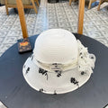 STRAW HAT WITH CHIFFON FLOWER WHITE 672758