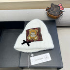 BEANIE HAT IN WHITE WOOL WITH BOW 421253