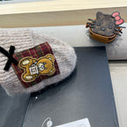 BEANIE HAT IN CAMEL BEIGE WOOL WITH BOW 421255