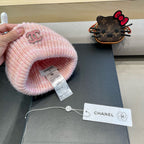 STRIPED KNITTED HAT IN LIGHT PINK WOOL 424515