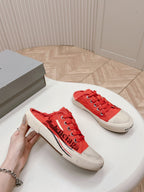 SNEAKER MULES IN RED CANVAS GRAFFITI LOGO