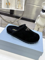 PRADA 25S FUR-LINED SABOT MULES IN BLACK SUEDE