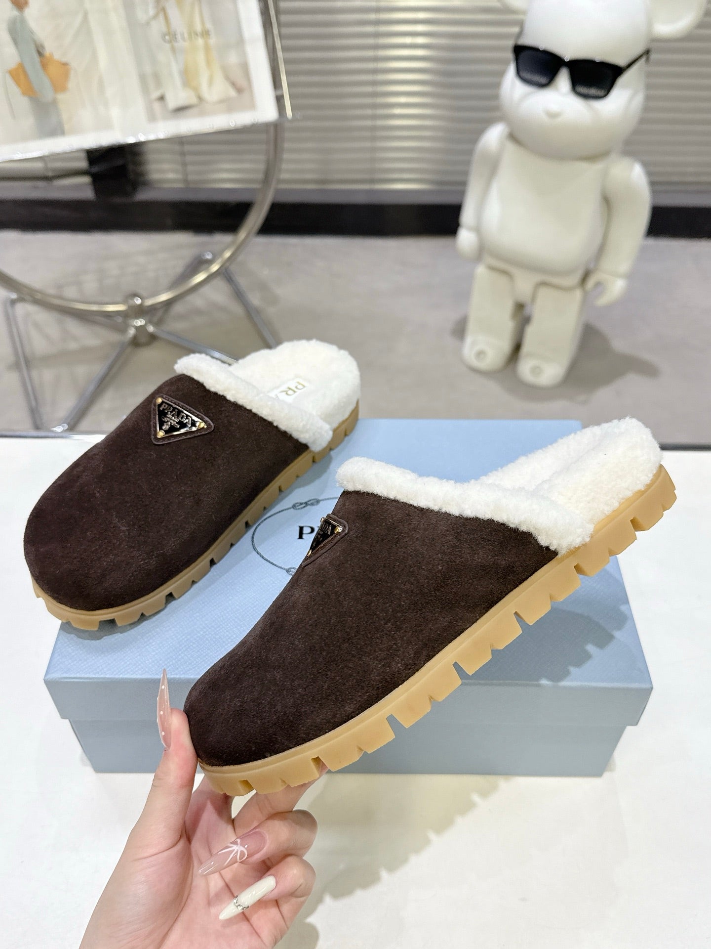 PRADA 25S FUR-LINED MULES IN DARK BROWN SUEDE