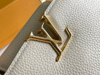 CAPUCINES MINI 21 BEIGE TAURILLON GOLD HARDWARE