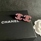 DOUBLE C STUD EARRINGS WITH PINK TRIM AND CENTER STONE