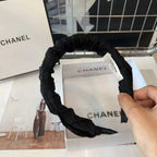 BLACK FABRIC WITH GOLD LOGO HAIRBAND 414448
