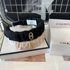 BLACK FABRIC WITH GOLD LOGO HAIRBAND 414448