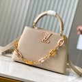 CAPUCINES BB 27CM BEIGE TAURILLON LEATHER