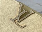 CAPUCINES EAST-WEST MINI 22 IN BANANA YELLOW TAURILLON GOLD HARDWARE
