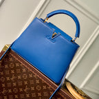 CAPUCINES BB 27 COBALT BLUE TAURILLON MOP GOLD HARDWARE
