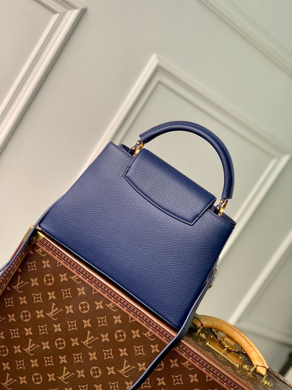 capucines mm 31.5 dark blue taurillon leather gold hardware