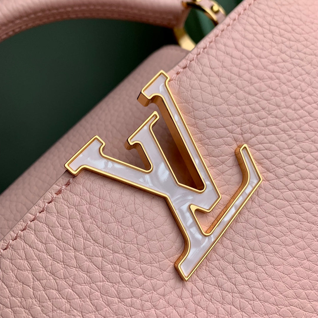 capucines mm 31.5 pink taurillon leather mop gold hardware