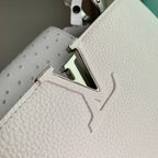 capucines mm 31.5 white taurillon leather silver hardware