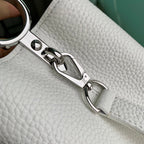 CAPUCINES MINI 21 WHITE TAURILLON SILVER HARDWARE