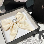 BOW-KNOT HAIR CLIP IN EGG SHELL SILK 358294