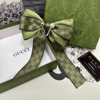 RIBBON BOW HAIR CLIP IN OLIVE GREEN RE-NYLON ATTACHED PEARL 358261
