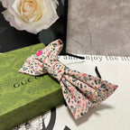 HAIRBAND IN LIGHT PINK FLORAL FABRIC 385853