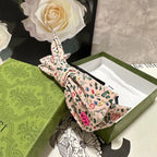 HAIRBAND IN LIGHT PINK FLORAL FABRIC 385853