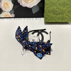 HAIRBAND IN NAVY BLUE FLORAL FABRIC 385854