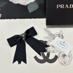BOW HAIR CLIP IN BLACK FABRIC 406107