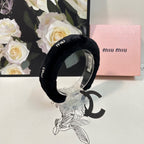 THICK HEADBAND WITH DIAMOND LOGO IN BLACK PLUSH FABRIC 412484
