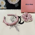 SET HEADBAND AND HAIR TIE IN LIGHT PINK FABRIC ATTACHED BOWS 432848
