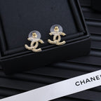 TWISTED ROPE STUD EARRINGS IN METAL WITH WHITE PEARLS